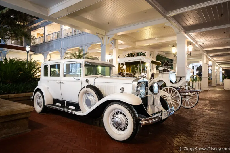 Old white car outside the entrance to Disney's Grand Floridian Resort & Spa