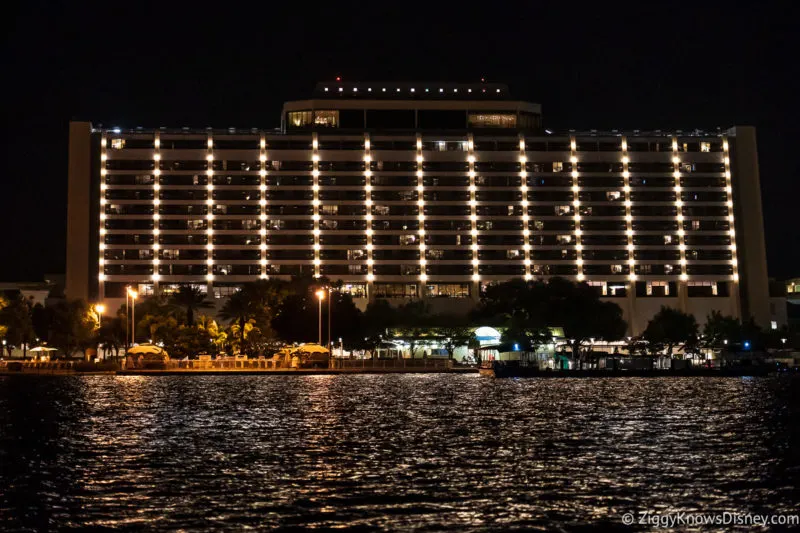Disney's Contemporary Resort at night with lights on the outside over the Seven Seas Lagoon