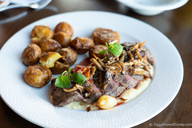 Steak with polenta and potatoes at Topolino's Terrace Character Breakfast