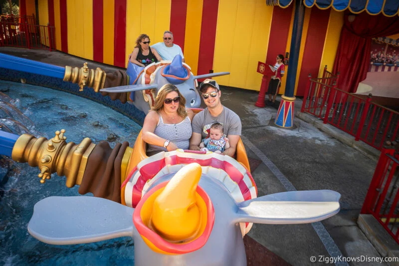taking baby on Dumbo the Flying Elephant Magic Kingdom