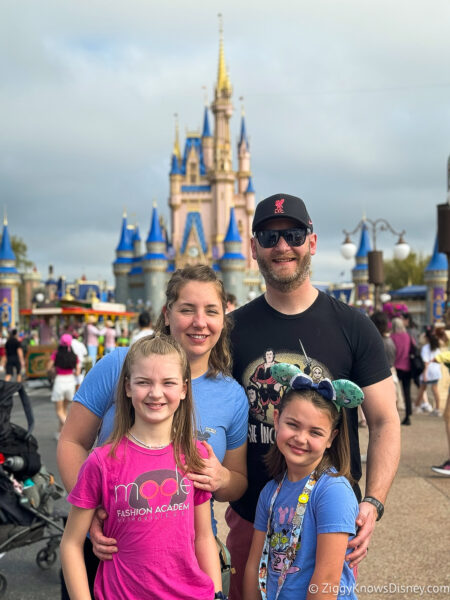 family in front of Cinderella Castle Magic Kingdom